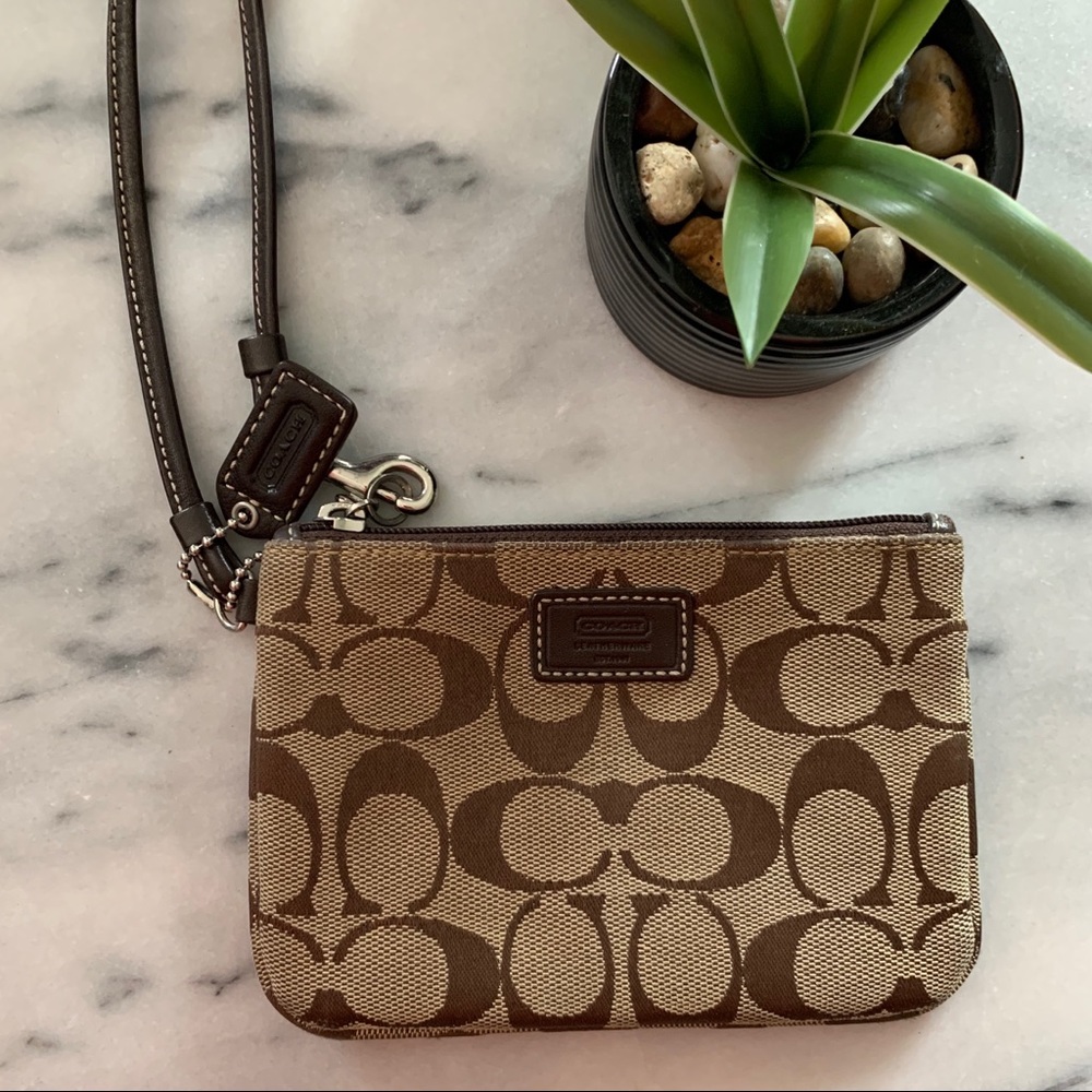 COACH brown/tan monogram wristlet